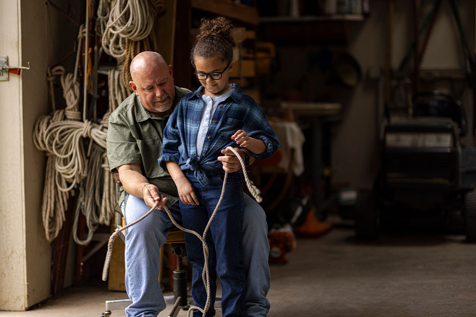 Kentucky man and grandchild interact on rural property financed by Rural 1st.